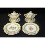 Continental porcelain dessert service, decorated with fruit on a yellow ground, consisting of ten