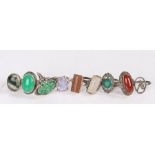 Nine white metal rings set with various stones etc (9)