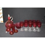 Cranberry glass, to include carafe, nine wine glasses, beaker, bowl, three salts (qty)