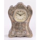 Early 20th Century silver mounted mantel clock, London marks rubbed, the Art Nouveau style case with