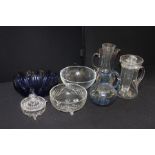 Glass lemonade jug with central lidded reservoir, blue glass and clear glass fruit bowls, blue glass