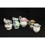 Copeland late Spode jug decorated with classical figures, four transfer decorated jugs (5)