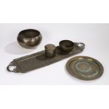 Indian metal ware, to include a long tray with scroll and leaf decoration, a dish, a pot and cover