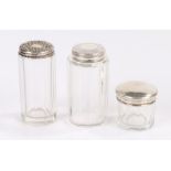 Three silver lidded clear glass dressing table pots (3)