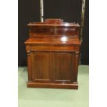 Victorian mahogany chiffonier, the scrolled panelled upstand with shelf above a frieze drawer and