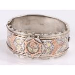 Silver bracelet, with gold overlaid flower design, 39 grams