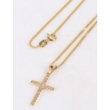 14 carat gold cross, attached to a 9 carat gold chain, 3.7 grams