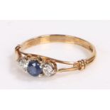 9 carat gold sapphire and cubic zirconia ring, the pierced shoulders leading to heart shape head