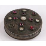 Silver and stone set box, with pearls and purple stones to the lid, 56mm diameter