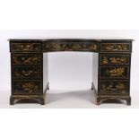Victorian kneehole desk, decorated in the Chinese black lacquer fashion with chinoiserie to the