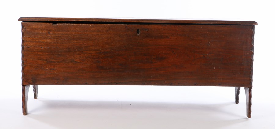 18th Century carved oak and elm coffer, the hinged rectangular top above panel sides and thumb