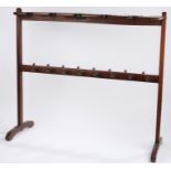 Late Victorian/ early Edwardian mahogany boot rack, with recesses for five pairs of boots and with