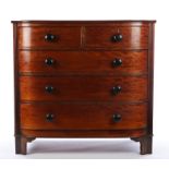 Victorian mahogany bow front chest of two short and three long drawers, with turned bun handles,