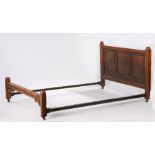 17th Century and later bed frame, with a panel head board and low foot board, 138cm wide