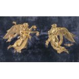 Two gilt metal angels, one with cherub holding a flaming torch, the other holding two children