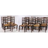 Matched set of twelve ladder back dining chairs, 19th Century, with ladder backs above rush sets and