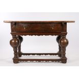 17th Century and later oak table, the rectangular top above a deep frieze drawer and baluster legs