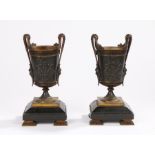 Pair of 19th Century French bronze garnitures, the bronze urns with tapering bead handles and