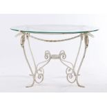 Cast iron garden table, the glass top above the barley twist and cabriole leg base, 77cm wide