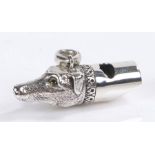 Silver whistle in the form of a Dog head