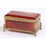 19th Century red agate and gilt metal casket, with bevelled agate panels and foliate decorated