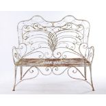 White painted garden bench, with scrolled back, arms and seat, raised on out-swept legs, 122cm wide