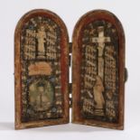 19th Century icon, the mahogany hinged case opening to reveal carved figures, Christ on the Cross, a