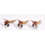 Three tin plate toy planes, GB 111 in yellow and red, (3)