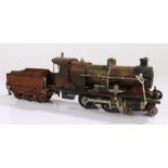 Marklin live O gauge Spirit steam locomotive and tender, E 4020, 4-4-0, in red with LMS to the