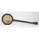 Banjo, with a skin head, in need of restoration