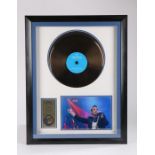 Robbie Williams signed photograph, housed in a frame with a copy of Intensive Care, certificate of