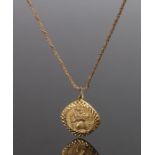 9 carat gold St Christopher medallion, attached to the 9 carat gold chain, 8.7 grams