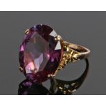 9 carat gold amethyst ring, the oval facetted amethyst within a four claw mount, ring size P