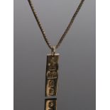 9 carat gold ingot pendant, attached to a 9 carat gold chain, 6.5 grams