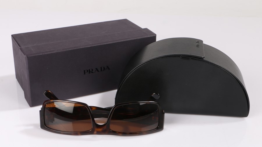 Prada, a pair of Prada sun glasses, boxed