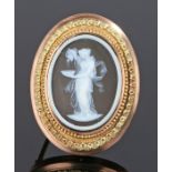 19th Century cameo, the carved agate cameo of a classical figure pouring from an urn with a yellow