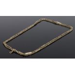 9 carat gold muff chain, with chain and bar links and clip end, 28.1 grams, 144cm long