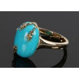 9 carat gold turquoise set ring, the cabochon cut turquoise with three overlapped leaf claws, P