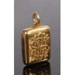 Fine Victorian locket, with hinged doors to the back and front with a crest to one side and an