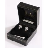 Pair of 9 carat ear studs with a cubic zirconia stone