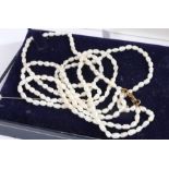 Three strand pearl necklace with gold coloured clasp, 40cm long