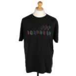 Ed Sheeran's Boxfresh black T-shirt, printed with red, green and blue building blocks, size