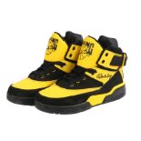 Ed Sheeran's Patrick Ewing black and yellow trainers, size UK10. All of the Ed Sheeran Collection