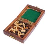 Ed Sheeran's travel chess set, housed in a folding wooden box. All of the Ed Sheeran Collection