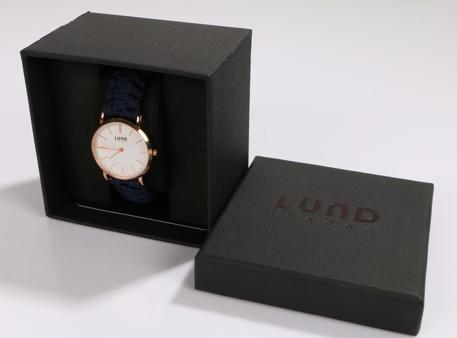 Lund rose gold coloured watch, the signed cream dial with rose gold coloured baton markers, quartz