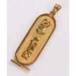 Egyptian themed gold pendant, with raised hieroglyphs, 5.1g