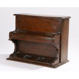 Victorian novelty stationary oak box, in the form of a piano, the top opening to reveal a letter