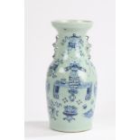 19th Century Chinese vase, moulded and decorated with Chinese furniture in blue and white, 42.5cm