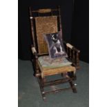 Edwardian rocking chair, with green velvet upholstered back and seat, turned spindle supports, on