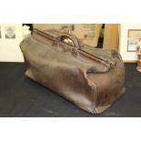 Leather Gladstone style bag by the Army & Navy Cooperative Society Limited